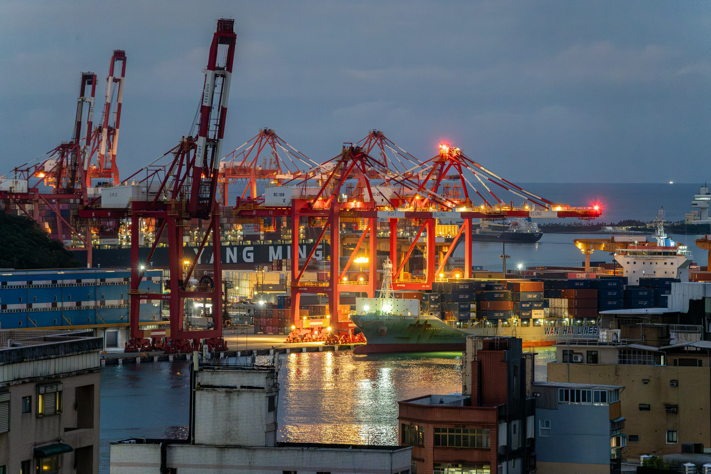 Container port cranes at dusk